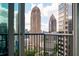 Balcony view of the city buildings on a sunny day at 1080 Peachtree Ne St # 1902, Atlanta, GA 30309