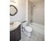 Functional bathroom features a vanity, toilet, and a bathtub with a shower head at 160 Pine Grove Dr, Canton, GA 30114