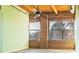 Bedroom featuring exposed brick wall and ceiling beams, and ample natural light at 204 Walker Sw St # 208, Atlanta, GA 30313