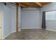 Spacious bedroom featuring an exposed wood beam ceiling and a window with block glass at 204 Walker Sw St # 208, Atlanta, GA 30313