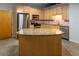 Modern kitchen with stainless steel appliances and a granite countertop island at 204 Walker Sw St # 208, Atlanta, GA 30313