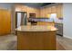 Kitchen featuring stainless steel appliances, wood cabinets, and stone countertops at 204 Walker Sw St # 208, Atlanta, GA 30313