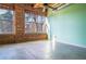 Bright, spacious room featuring exposed brick and concrete floors; lots of natural light at 204 Walker Sw St # 208, Atlanta, GA 30313