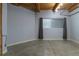 Spacious living room with exposed beam ceilings and concrete floors at 204 Walker Sw St # 208, Atlanta, GA 30313