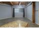 Spacious living room with exposed beam ceilings and concrete floors at 204 Walker Sw St # 208, Atlanta, GA 30313