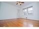 Sunny bedroom with hardwood floors, large windows, and natural light at 2191 Sweetwater Ln, Austell, GA 30106