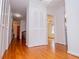 Hallway with hardwood floors and multiple closets for ample storage space at 2191 Sweetwater Ln, Austell, GA 30106