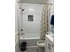 Bathroom featuring subway tile surround, shower with a tub and modern fixtures at 4025 Gretna Green Dr, Decatur, GA 30035