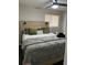 Bedroom featuring decorative headboard, modern lamps, and stylish throw pillows at 4025 Gretna Green Dr, Decatur, GA 30035