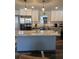 Well-lit kitchen featuring granite countertops, stainless steel appliances, and modern cabinetry at 4025 Gretna Green Dr, Decatur, GA 30035