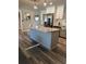 Kitchen featuring granite countertops, stainless steel appliances, modern cabinetry, and vinyl plank flooring at 4025 Gretna Green Dr, Decatur, GA 30035
