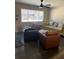 Cozy living room featuring a plush sofa, leather chairs, and modern vinyl plank flooring at 4025 Gretna Green Dr, Decatur, GA 30035