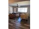 Inviting living room with a plush sofa, leather chairs, and modern vinyl plank flooring at 4025 Gretna Green Dr, Decatur, GA 30035
