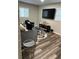 Spacious living room with modern furniture, a large TV, and plenty of natural light for comfortable gatherings at 4025 Gretna Green Dr, Decatur, GA 30035
