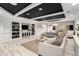 The spacious living room is equipped with a large entertainment center and stylish furniture at 200 River Vista Dr # 608, Atlanta, GA 30339