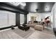 Open-concept living room features modern furniture, shutters, and stylish decor at 200 River Vista Dr # 608, Atlanta, GA 30339