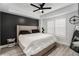 Tranquil main bedroom with a ceiling fan, ample natural light, and wood-look flooring at 200 River Vista Dr # 608, Atlanta, GA 30339