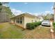 Single-story home featuring horizontal siding and a well-maintained lawn, exuding suburban charm and curb appeal at 7595 Waverly Loop, Fairburn, GA 30213