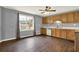 Functional kitchen with natural wood cabinets and ample counter space at 257 Crossroads Church Rd, Rockmart, GA 30153