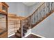 Beautiful staircase features wood and iron at 257 Crossroads Church Rd, Rockmart, GA 30153