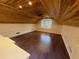 Bonus room featuring wood paneling, recessed lights, ceiling fan and hardwood flooring at 215 Buck Run, Loganville, GA 30052