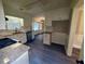 Well-lit kitchen showcasing granite counters, stainless steel appliances, and ample cabinet space at 215 Buck Run, Loganville, GA 30052
