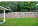 Beautifully landscaped backyard features multi-tiered retaining walls and stairway to upper level at 2717 Skyland Dr, Brookhaven, GA 30319