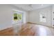 Bedroom with hardwood floors, a ceiling fan, and two windows at 2717 Skyland Dr, Brookhaven, GA 30319