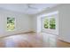 Spacious and airy bedroom filled with natural light streaming through multiple windows at 2717 Skyland Dr, Brookhaven, GA 30319