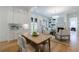 Dining Room view features french doors and leads into an open Living Room at 2717 Skyland Dr, Brookhaven, GA 30319
