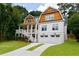 Stunning two-story home featuring a two-car garage, charming porch, and beautiful lawn at 2717 Skyland Dr, Brookhaven, GA 30319