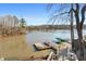 Lake view with docks on a sunny day, providing private water access at 405 Miller Rd, Covington, GA 30014