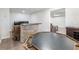 Finished basement features a bar, poker table and entertainment area at 6145 Stargazer Way, Cumming, GA 30028