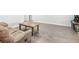 This finished basement has wood floors, plenty of space, and neutral colored walls at 6145 Stargazer Way, Cumming, GA 30028
