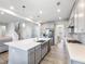Spacious kitchen with stainless steel appliances, large island, and plenty of cabinet space at 6145 Stargazer Way, Cumming, GA 30028