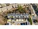 Detailed aerial shot of townhomes with solar panels, driveways, and manicured landscaping at 1047 Brandsford Nw St, Atlanta, GA 30318