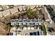 An aerial perspective of townhomes, highlighting architectural layout, rooftop solar panels, and neatly arranged parking at 1047 Brandsford Nw St, Atlanta, GA 30318