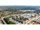 A scenic aerial view showcasing the community's design, with lush trees and a cityscape silhouette in the distance at 1047 Brandsford Nw St, Atlanta, GA 30318