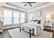 Tranquil bedroom features large windows, trey ceiling, and a comfortable bed with stylish decor at 1047 Brandsford Nw St, Atlanta, GA 30318