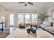 Spacious living room filled with natural light featuring stylish decor at 1047 Brandsford Nw St, Atlanta, GA 30318