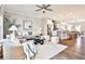 Open concept living space with modern furnishings flows into the kitchen area at 1047 Brandsford Nw St, Atlanta, GA 30318
