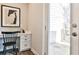 Cozy office space features a built-in desk with drawers and access to an outdoor balcony at 1047 Brandsford Nw St, Atlanta, GA 30318