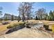 Relaxing park area with picnic tables, walking paths, and green space for outdoor enjoyment at 1047 Brandsford Nw St, Atlanta, GA 30318