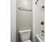 A bathroom with a bathtub, shower, toilet, and a towel rack at 1604 Quail Sw Run, Conyers, GA 30094