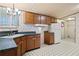 Kitchen with cabinets, countertop, and vinyl floor at 718 Old Tennessee Ne Hwy, White, GA 30184