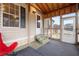 Inviting screened porch with a view, carpet, and a white front door at 718 Old Tennessee Ne Hwy, White, GA 30184