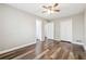 Spacious bedroom with ample closet space and wood-look flooring at 1276 Scripps Sw Ct, Marietta, GA 30008