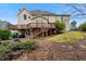 Expansive backyard featuring a large deck and a hot tub on the patio at 2883 Observation Nw Pt, Marietta, GA 30064