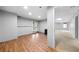 Finished basement with wood and carpet flooring, and a door leading to the exterior at 2883 Observation Nw Pt, Marietta, GA 30064