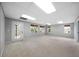 Finished basement with carpet flooring, lots of light and a door leading to the exterior at 2883 Observation Nw Pt, Marietta, GA 30064
